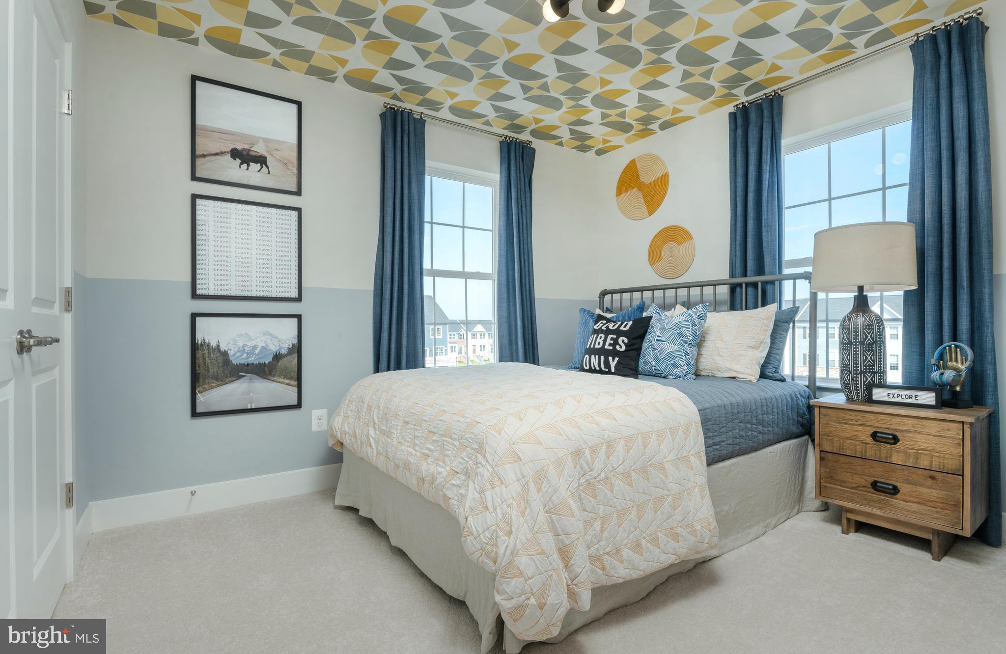 7708 Johnnycake Road Windsor Mill, MD 21244 - Photo 16 of 18 a bedroom with a bed and window