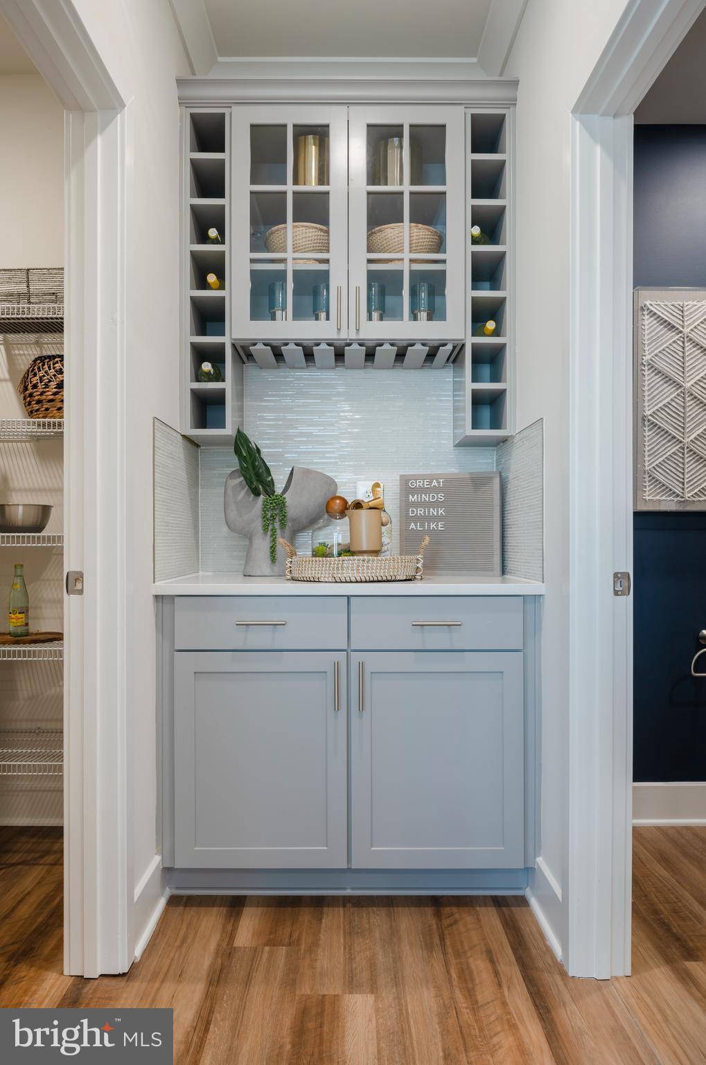 7708 Johnnycake Road Windsor Mill, MD 21244 - Photo 5 of 18 a view of wooden floor and windows in a room