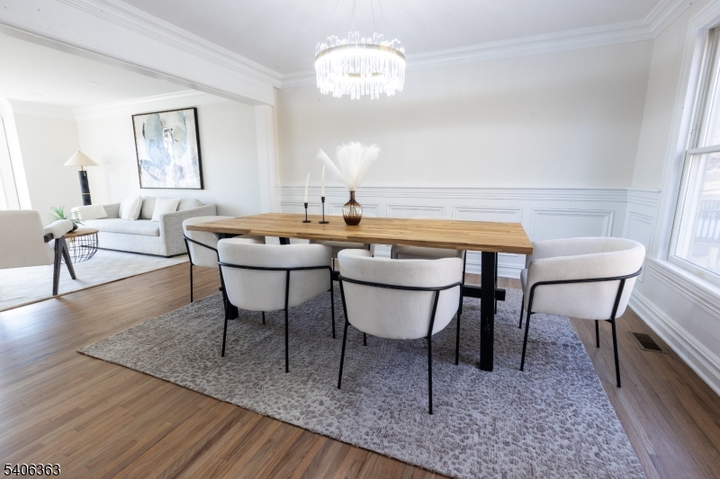 13 Sycamore Way Warren, NJ 07059 - Photo 13 of 50 a dining room with furniture and wooden floor