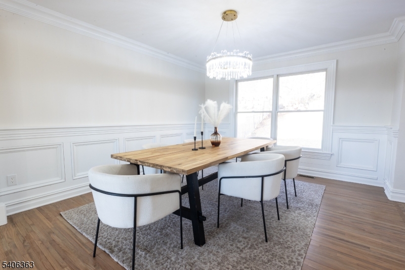 13 Sycamore Way Warren, NJ 07059 - Photo 14 of 50 a view of a dining room with furniture window and wooden floor