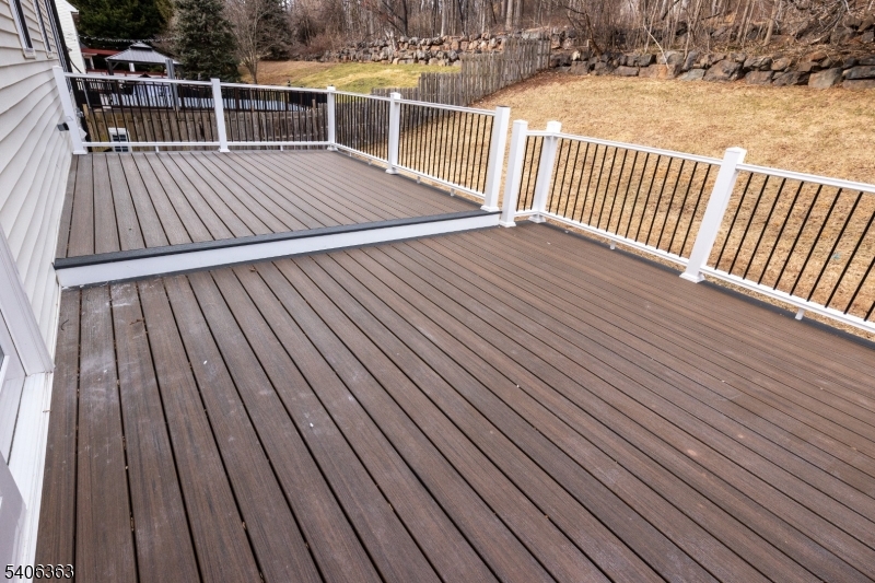 13 Sycamore Way Warren, NJ 07059 - Photo 43 of 50 a view of deck with wooden floor and fence