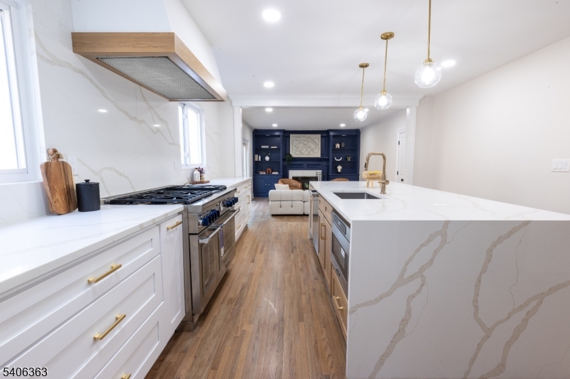 13 Sycamore Way Warren, NJ 07059 - Photo 47 of 50 a kitchen with a sink a counter top space stainless steel appliances and cabinets