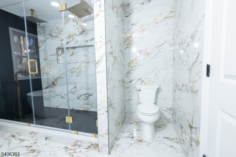 13 Sycamore Way Warren, NJ 07059 - Photo 49 of 50 a bathroom with a toilet and a shower