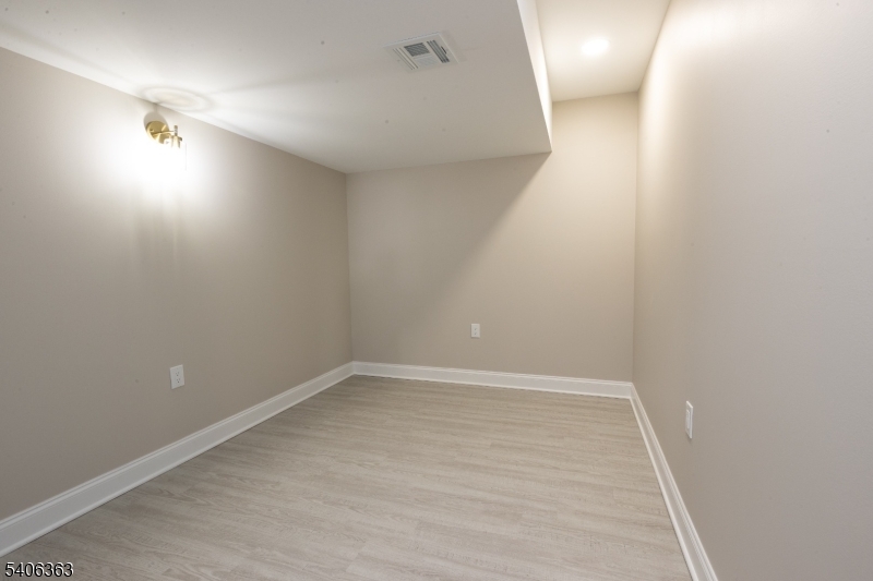 13 Sycamore Way Warren, NJ 07059 - Photo 50 of 50 wooden floor in an empty room