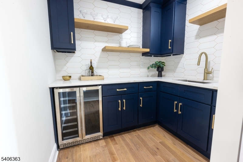 13 Sycamore Way Warren, NJ 07059 - Photo 7 of 50 a kitchen with a sink and cabinets