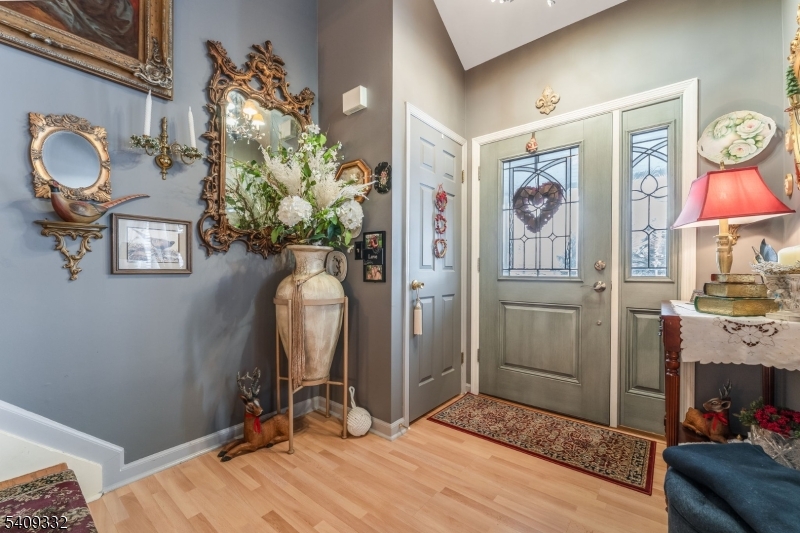 7 Rachel Court Clinton, NJ 08809 - Photo 11 of 42 a view of a livingroom with furniture and a chandelier