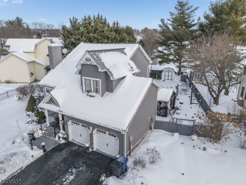 7 Rachel Court Clinton, NJ 08809 - Photo 27 of 42 a roof covered with tall trees