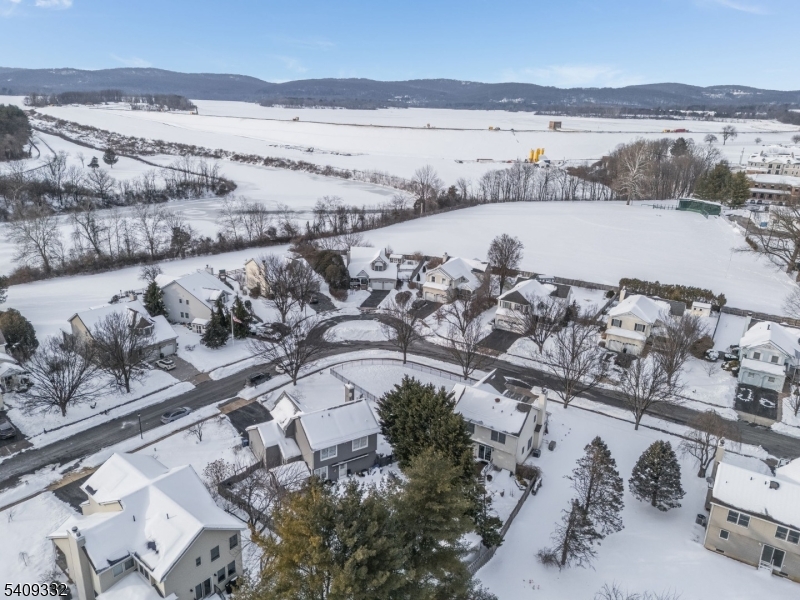 7 Rachel Court Clinton, NJ 08809 - Photo 35 of 42 a view of a lake with a mountain