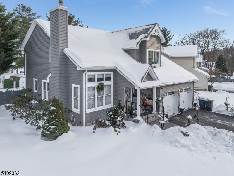 7 Rachel Court Clinton, NJ 08809 - Photo 4 of 42 a front view of a house with sitting area