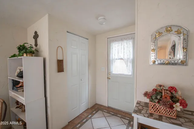 a view of a house with a small yard