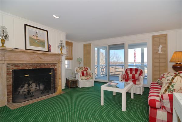56 Sand Point Barnstable, MA 02655 - Photo 13 of 20 a living room with fireplace furniture and a fireplace