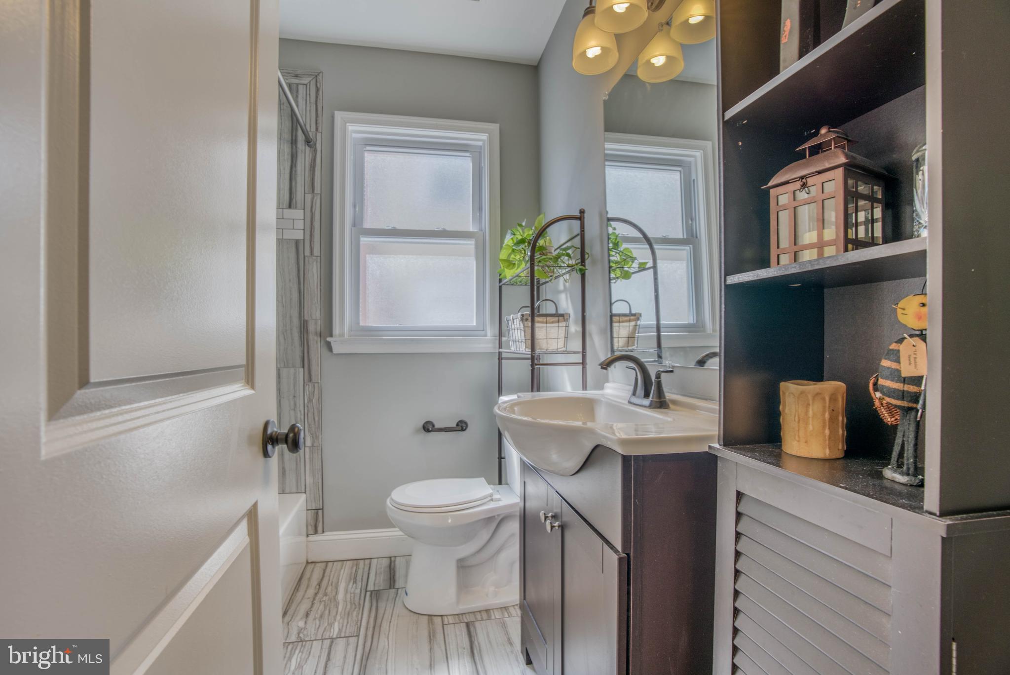 3031 Parktowne Road Baltimore, MD 21234 - Photo 25 of 48 Main level bathroom beautiful & bright