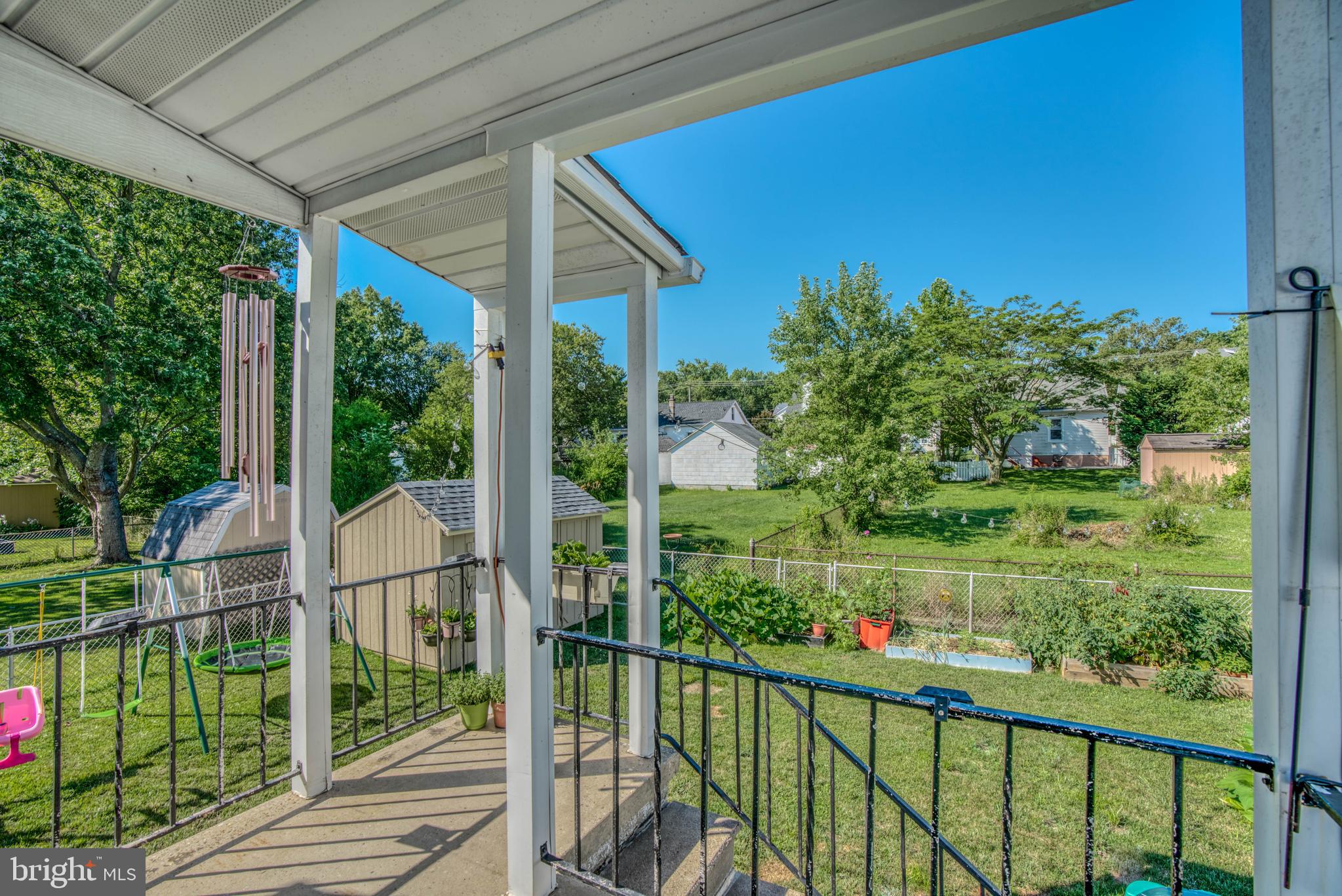 3031 Parktowne Road Baltimore, MD 21234 - Photo 39 of 48 Rear porch overlooking fully fenced yard