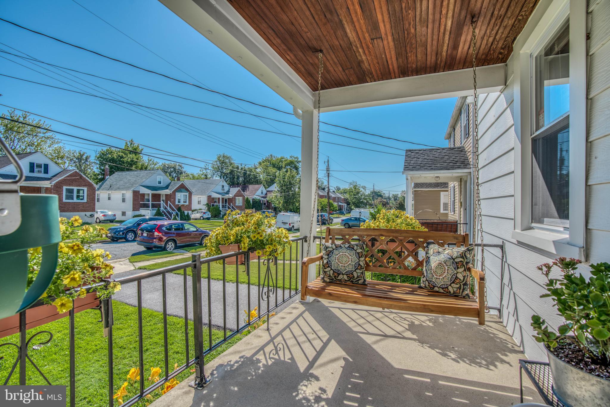 3031 Parktowne Road Baltimore, MD 21234 - Photo 10 of 48 Quaint gated front porch overlooking yard