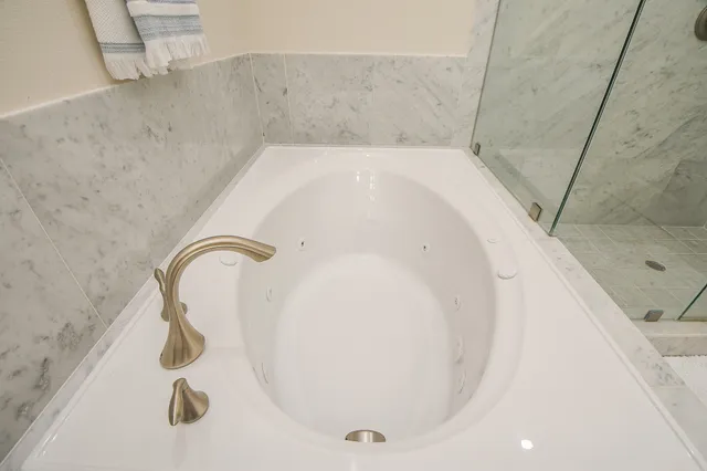 a bathroom with a tub