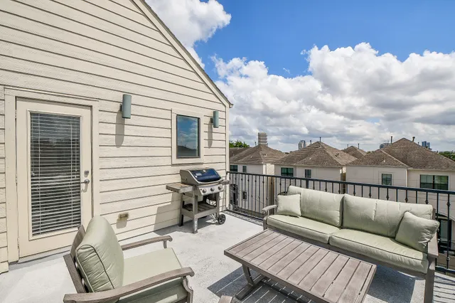 a view of a terrace with furniture