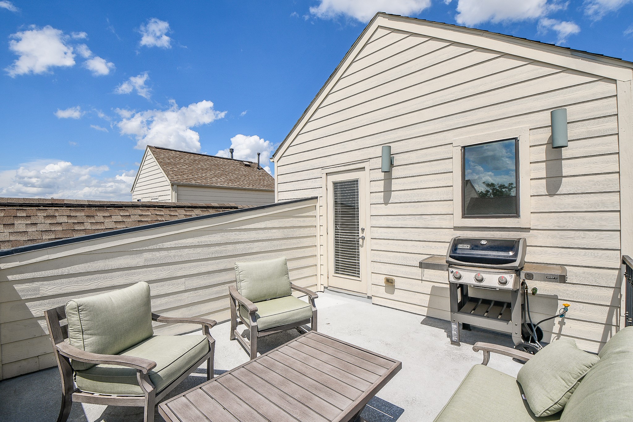 1204 Fowler Street Houston, TX 77007 - Photo 24 of 25 a view of a chairs and table in the back yard of the house