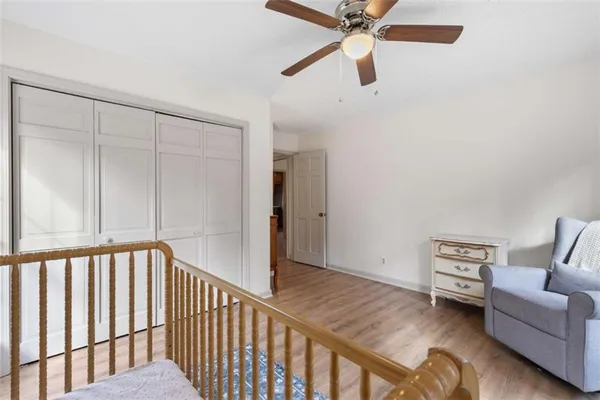 a view of a livingroom with a ceiling fan