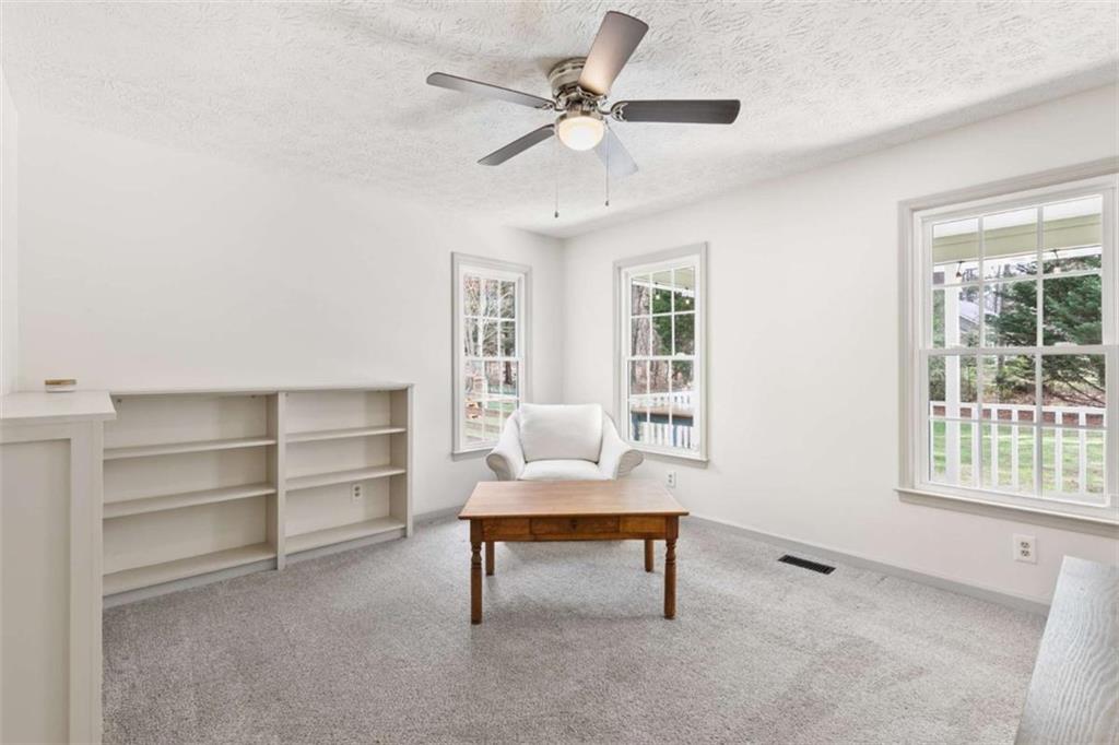 138 Adams Road Fayetteville, GA 30214 - Photo 32 of 38 a living room with furniture