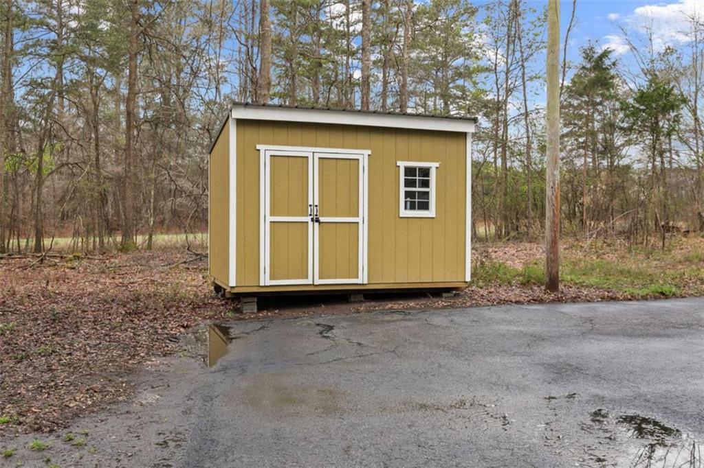 138 Adams Road Fayetteville, GA 30214 - Photo 38 of 38 a front view of a house with a yard
