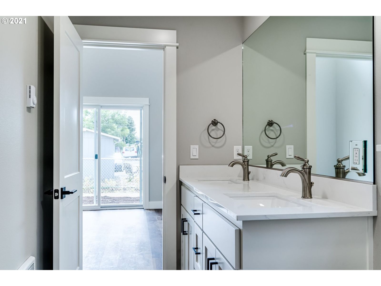 380 19th Springfield, OR 97477 - Photo 9 of 24 a bathroom with a sink and a mirror