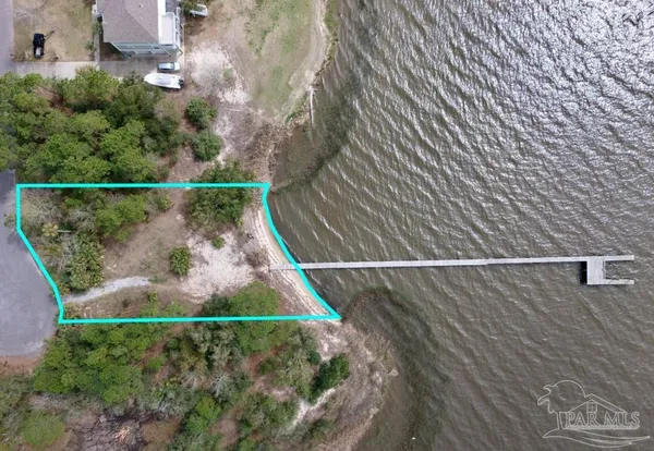 a view of a balcony with floor to ceiling windows