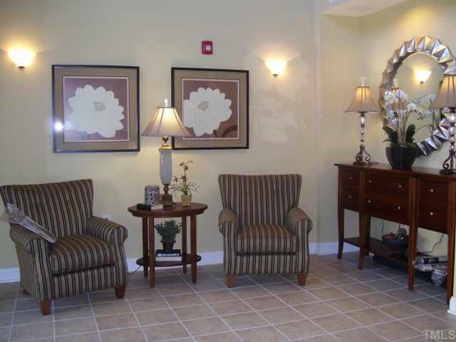 3811 Lunceston Way, Unit 307 Raleigh, NC 27613 - Photo 3 of 10 Upon entry your new condo features and inviting foyer for your guests, mail duties and the elevator!