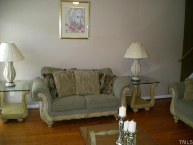 4245 Tensity Drive Raleigh, NC 27604 - Photo 3 of 10 a living room with furniture and a couch