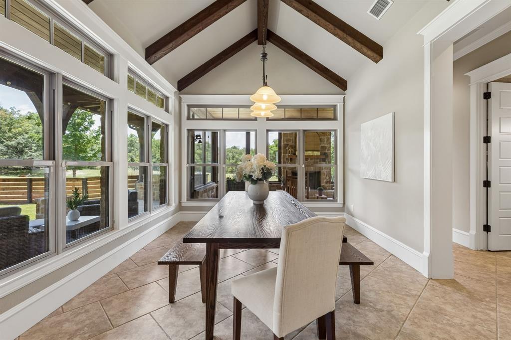 206 Rodeo Drive Azle, TX 76020 - Photo 17 of 40 Secondary Dining Area with access to screened in porch