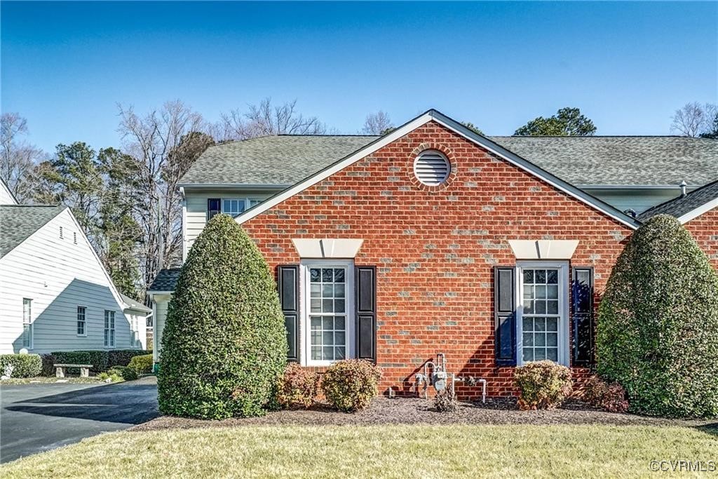 10132 Forest Patch Drive Mechanicsville, VA 23116 - Photo 1 of 43 a front view of a house with garden