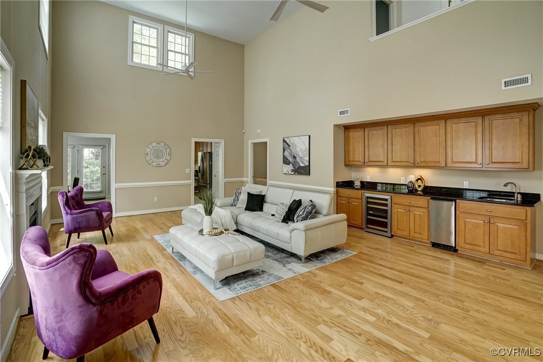 10132 Forest Patch Drive Mechanicsville, VA 23116 - Photo 8 of 43 a living room with furniture kitchen and a wooden floor
