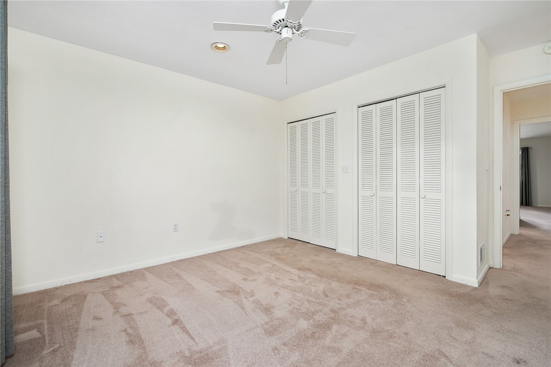 34 Hickory Way Clemson, SC 29631 - Photo 34 of 39 Comfortable carpeted bedroom with dual bi-fold closets and overhead ceiling fan.