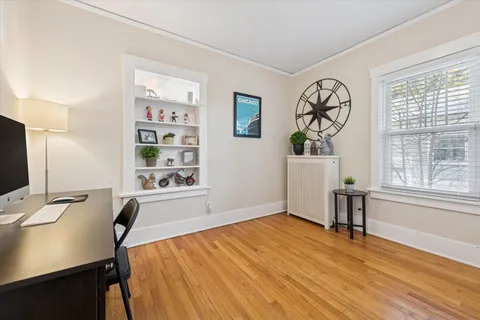 a workspace with furniture and window