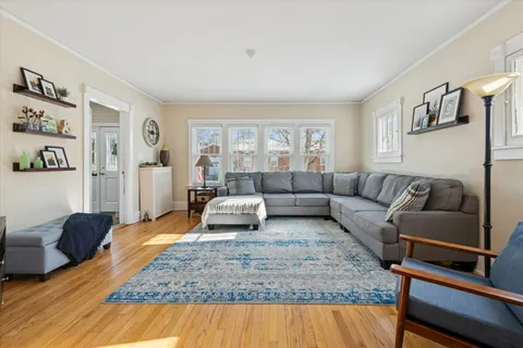 a living room with furniture and a couch