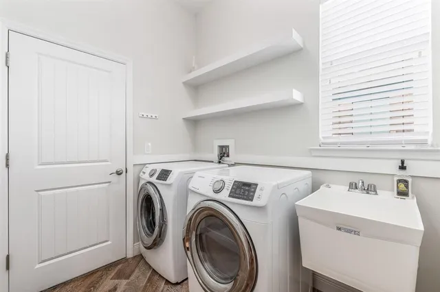 a utility room with dryer and washer