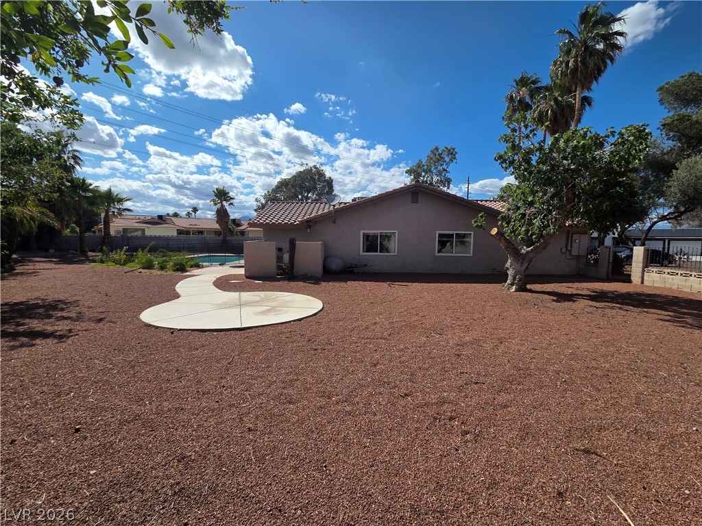 3381 Westwind Road Las Vegas, NV 89146 - Photo 5 of 52 Discover a generously sized yard, ready for your creative landscaping touches.