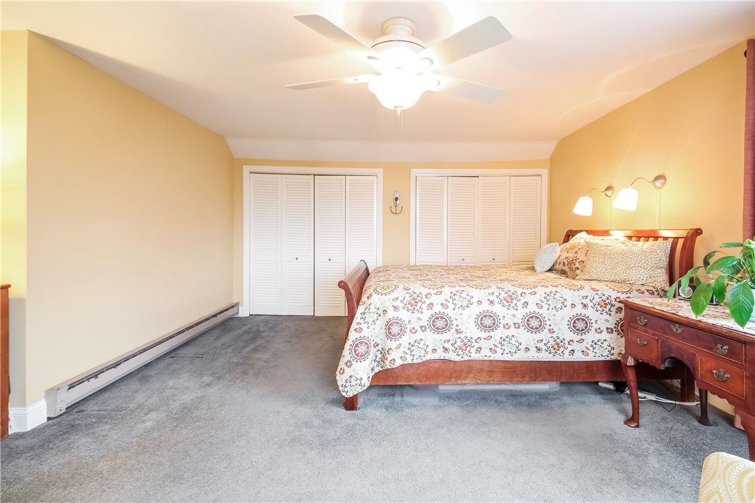 55 What Cheer Road Narragansett, RI 02882 - Photo 17 of 20 Master Bedroom has private bath, carpet and ceiling fan. Ample space to relax and enjoy the view