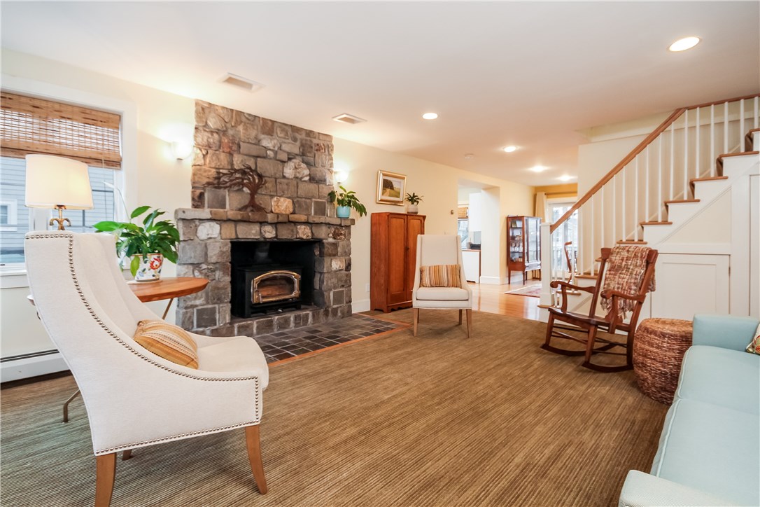 55 What Cheer Road Narragansett, RI 02882 - Photo 3 of 20 Large Living Room with hardwood stairs to second floor. Great natural light and ample recessed can lighting