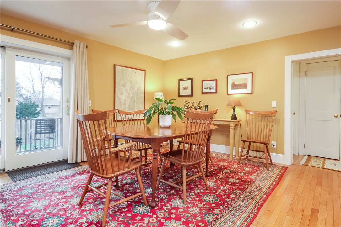 55 What Cheer Road Narragansett, RI 02882 - Photo 6 of 20 Large Dining room. Slider to Deck and fenced yard. Kitchen to left and hallway on right with 2 bedrooms and full bath