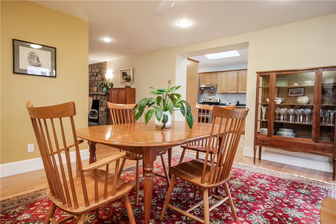 55 What Cheer Road Narragansett, RI 02882 - Photo 7 of 20 Dining Room showing oversize opening to kitchen and Living to left