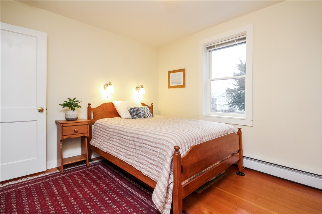 55 What Cheer Road Narragansett, RI 02882 - Photo 10 of 20 One of two first floor bedrooms. Hardwood Floors!