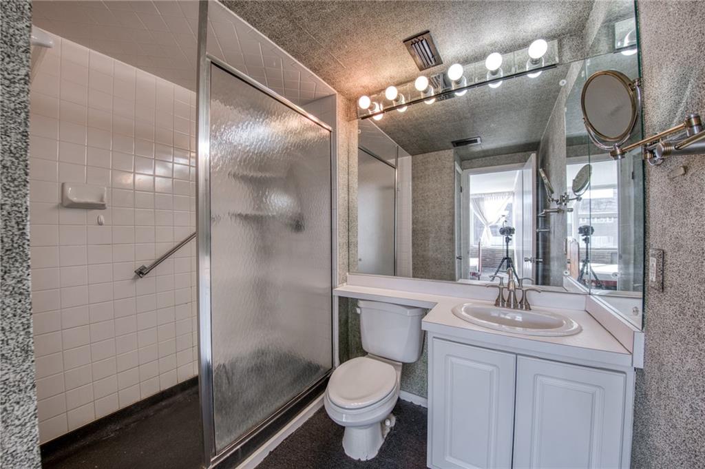552 North Neville Street, Unit PH2 Pittsburgh, PA 15213 - Photo 16 of 42 a bathroom with a toilet a sink and a mirror