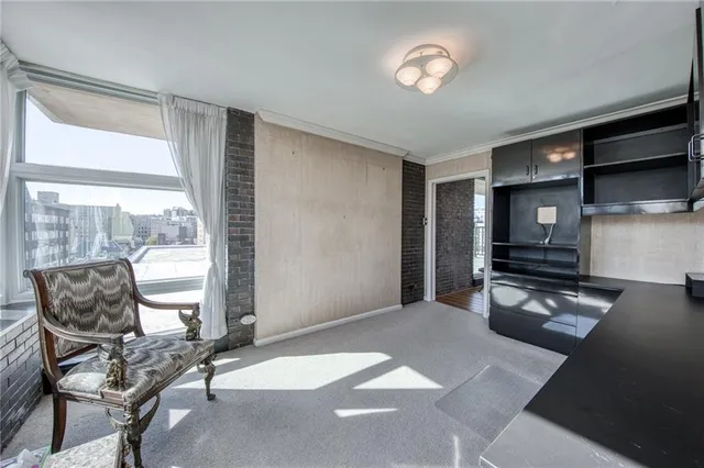 a view of roof deck with patio