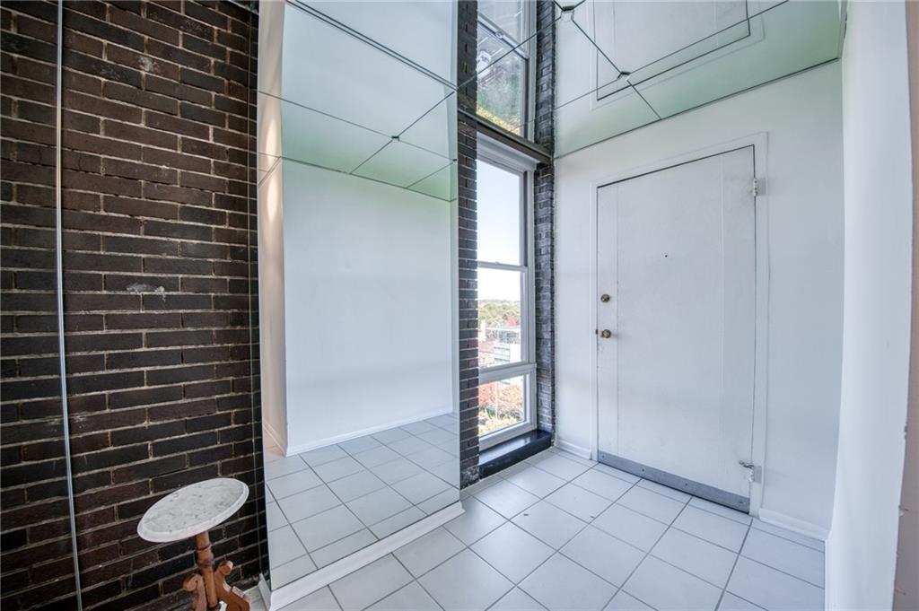 552 North Neville Street, Unit PH2 Pittsburgh, PA 15213 - Photo 3 of 42 a view of an empty room and bathroom