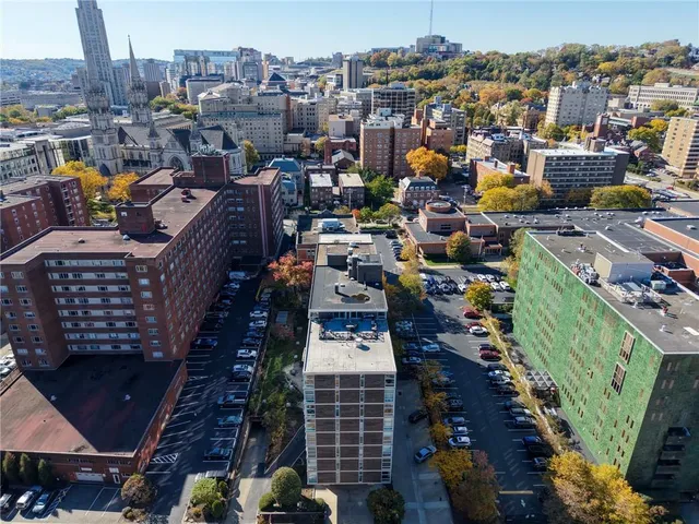 a view of a city with tall buildings