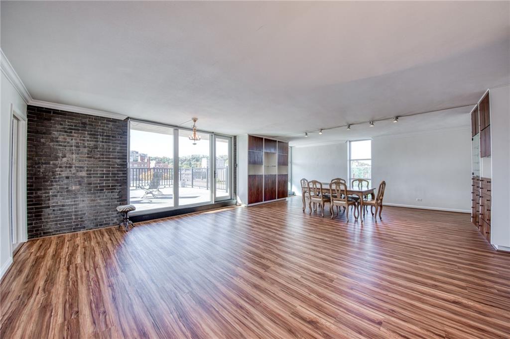 552 North Neville Street, Unit PH2 Pittsburgh, PA 15213 - Photo 8 of 42 a view of dining room with furniture and wooden floor