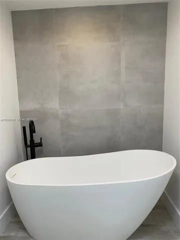 a bathroom with a bathtub