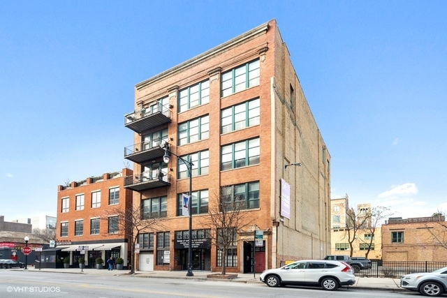 1016 West Madison Street, Unit 3S Chicago, IL 60607 - Photo 1 of 22 a city street lined with buildings and cars