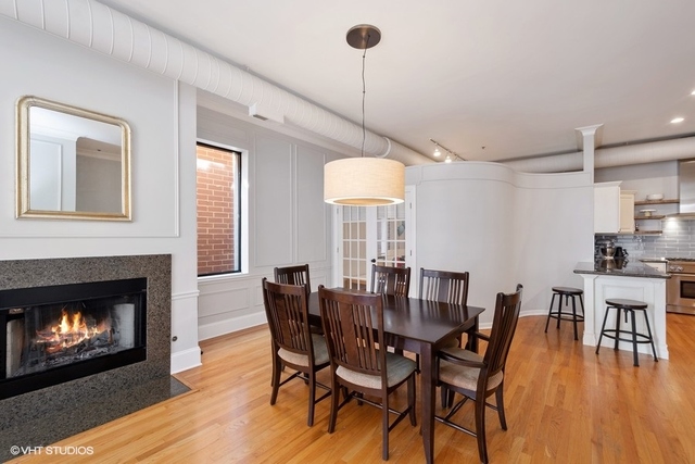 1016 West Madison Street, Unit 3S Chicago, IL 60607 - Photo 11 of 22 a view of a dining room with furniture and wooden floor