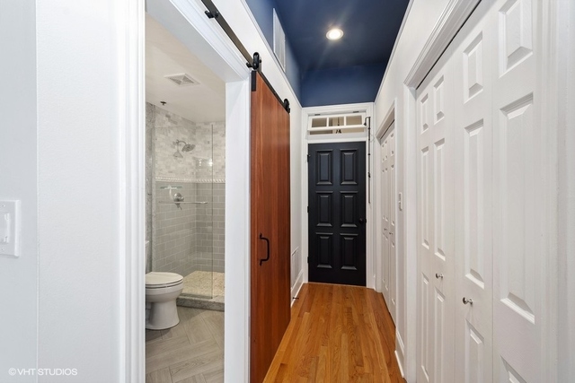 1016 West Madison Street, Unit 3S Chicago, IL 60607 - Photo 15 of 22 a bathroom with a toilet and a shower